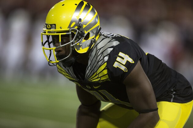 Oregon cornerback Ifo Ekpre-Olomu (14) waits for the start of the play against Washington State during the first quarter of an NCAA college football game Saturday, Sept. 20, 2014, at Martin Stadium in Pullman, Wash. Oregon won 38-31. (AP Photo/Dean Hare)