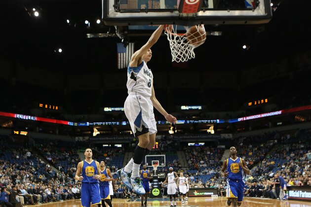 MINNEAPOLIS, MN - DECEMBER 8: Zach LaVine #8 of the Minnesota Timberwolves dunks against the Golden State Warriors on December 8, 2014 at Target Center in Minneapolis, Minnesota. NOTE TO USER: User expressly acknowledges and agrees that, by downloading and or using this Photograph, user is consenting to the terms and conditions of the Getty Images License Agreement. Mandatory Copyright Notice: Copyright 2014 NBAE (Photo by Jordan Johnson/NBAE via Getty Images)