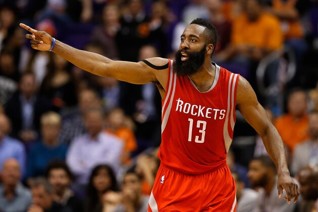 PHOENIX, AZ - FEBRUARY 10:  James Harden #13 of the Houston Rockets reacts after scoring against the Phoenix Suns during the second half of the NBA game at US Airways Center on February 10, 2015 in Phoenix, Arizona. The Rockets defeated the Suns 127-118. NOTE TO USER: User expressly acknowledges and agrees that, by downloading and or using this photograph, User is consenting to the terms and conditions of the Getty Images License Agreement.  (Photo by Christian Petersen/Getty Images)