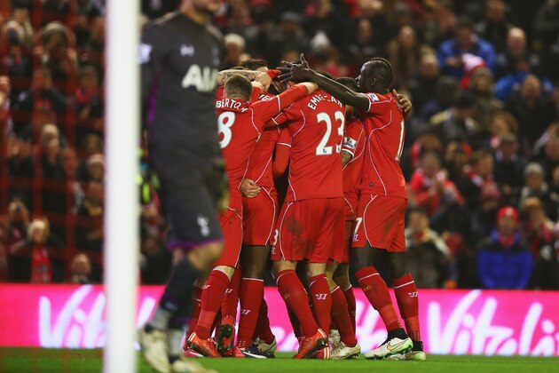 LIVERPOOL, ENGLAND - FEBRUARY 10:  Liverpool players celebrate the goal scored by Mario Balotelli during the Barclays Premier League match between Liverpool and Tottenham Hotspur at Anfield on February 10, 2015 in Liverpool, England.  (Photo by Clive Brunskill/Getty Images)