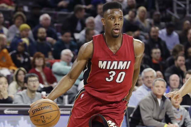 Miami Heat guard Norris Cole drives during the first half of an NBA basketball game against the Detroit Pistons, Tuesday, Feb. 3, 2015 in Auburn Hills, Mich. (AP Photo/Carlos Osorio)