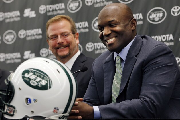 New York Jets head coach Todd Bowles, right, speaks during a press conference introducing the team's new management, Wednesday, Jan. 21, 2015, in Florham Park, N.J. Mike Maccagnan, the team's new general manager, listens at left. (AP Photo/Julio Cortez)