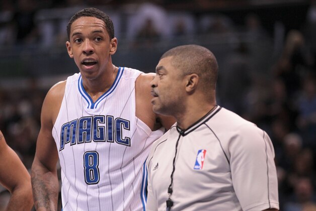 Jan 31, 2015; Orlando, FL, USA;  Orlando Magic forward Channing Frye (8) talks to referee Tony Brothers (25) during the third quarter of an NBA basketball game against the Dallas Mavericks at Amway Center. The Mavericks won 108-93. Mandatory Credit: Reinhold Matay-USA TODAY Sports