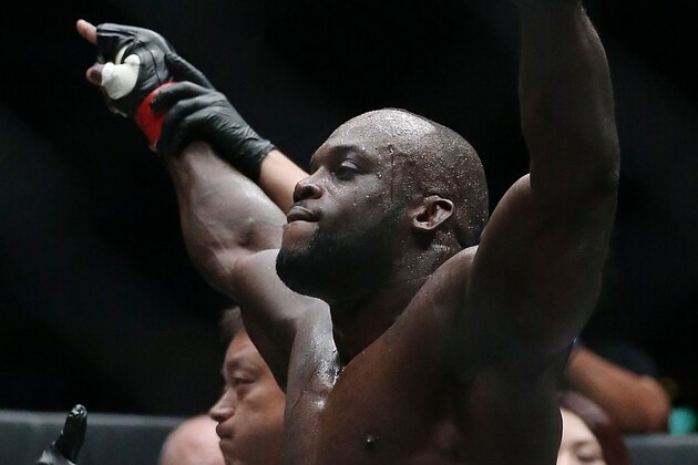 SINGAPORE - OCTOBER 06:  Melvin Manhoef of the Netherlands celebrates victory over Ryo Kawamura of Japan during the One Fighting Championship, at Singapore Indoor Stadium on October 6, 2012 in Singapore.  (Photo by Chris McGrath/Getty Images)