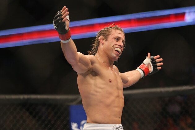 ANAHEIM, CA - FEBRUARY 23:  Urijah Faber celebrates his Bantamweight victory over Ivan Menjivar at Honda Center on February 23, 2013 in Anaheim, California.  (Photo by Jeff Gross/Getty Images)