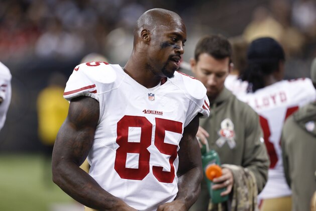 San Francisco 49ers tight end Vernon Davis (85) walks the sideline in the second half of an NFL football game against the New Orleans Saints in New Orleans, Sunday, Nov. 9, 2014. (AP Photo/Jonathan Bachman)