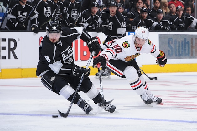 LOS ANGELES, CA - JANUARY 28: Drew Doughty #8 of the Los Angeles Kings handles the puck against Brandon Saad #20 of the Chicago Blackhawks at STAPLES Center on January 28, 2015 in Los Angeles, California. (Photo by Juan Ocampo/NHLI via Getty Images) LOS ANGELES, CA - JANUARY 28: Drew Doughty #8 of the Los Angeles Kings handles the puck against Brandon Saad #20 of the Chicago Blackhawks at STAPLES Center on January 28, 2015 in Los Angeles, California. (Photo by Juan Ocampo/NHLI via Getty Images)