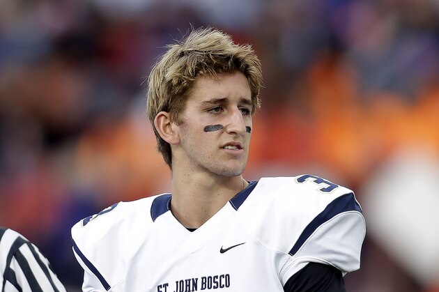 St. John Bosco quarterback Josh Rosen takes the field before a high school football game against Bishop Gorman on Friday, Sept. 26, 2014, in Las Vegas. (AP Photo/Isaac Brekken)