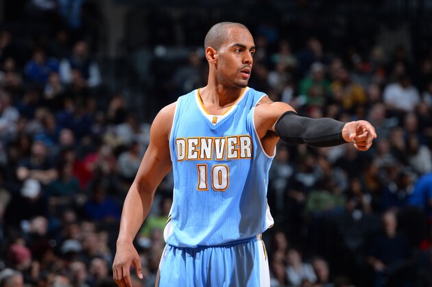 BROOKLYN,NY - DECEMBER 23: Arron Afflalo #10 of the Denver Nuggets gives direction to his team against the Brooklyn Nets on December 23, 2014 at the Barclays Center in Brooklyn, NY. NOTE TO USER: User expressly acknowledges and agrees that, by downloading and or using this photograph, User is consenting to the terms and conditions of the Getty Images License Agreement. Mandatory Copyright Notice: Copyright 2014 NBAE (Photo by Jesse D. Garrabrant/NBAE via Getty Images)
