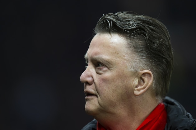Manchester United's manager Louis van Gaal takes to the touchline before his team's English FA Cup fourth-round replay soccer match between Manchester United and Cambridge at Old Trafford Stadium, Manchester, England, Tuesday Feb. 3, 2015. (AP Photo/Jon Super)