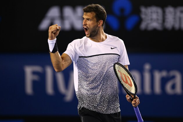 MELBOURNE, AUSTRALIA - JANUARY 25:  Grigor Dimitrov of Bulgaria celebrates winning the second set in his fourth round match against  Andy Murray of Great Britain during day seven of the 2015 Australian Open at Melbourne Park on January 25, 2015 in Melbourne, Australia.  (Photo by Clive Brunskill/Getty Images)
