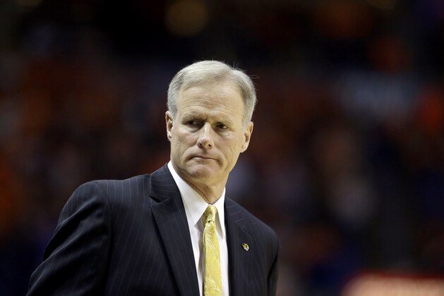 Missouri head coach Kim Anderson is seen on the sidelines during the first half of an NCAA college basketball game against Illinois Saturday, Dec. 20, 2014, in St. Louis. (AP Photo/Jeff Roberson)