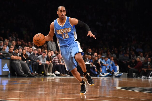 BROOKLYN,NY - DECEMBER 23: Arron Afflalo #10 of the Denver Nuggets dribbles the ball against the Brooklyn Nets on December 23, 2014 at the Barclays Center in Brooklyn, NY. NOTE TO USER: User expressly acknowledges and agrees that, by downloading and or using this photograph, User is consenting to the terms and conditions of the Getty Images License Agreement. Mandatory Copyright Notice: Copyright 2014 NBAE (Photo by Jesse D. Garrabrant/NBAE via Getty Images)