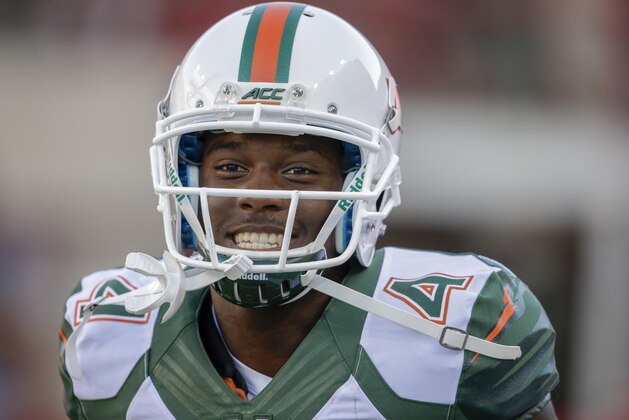 Miami wide receiver Phillip Dorsett (4) smiles before an NCAA college football game against Nebraska in Lincoln, Neb., Saturday, Sept. 20, 2014. (AP Photo/Nati Harnik)