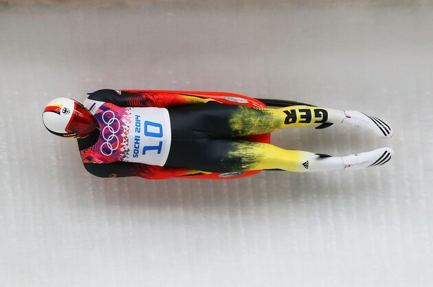 SOCHI, RUSSIA - FEBRUARY 08:  Felix Loch of Germany makes a run during the Luge Men's Singles on Day 1 of the Sochi 2014 Winter Olympics at the Sliding Center Sanki on February 8, 2014 in Sochi, Russia.  (Photo by Alex Livesey/Getty Images)
