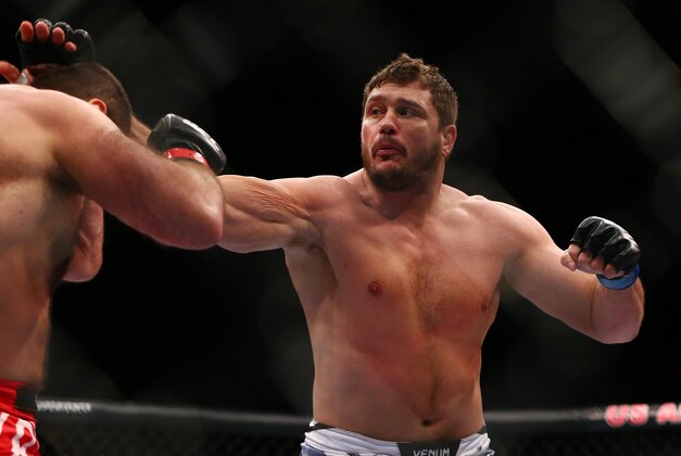 December 13, 2014; Phoenix, AZ, USA; Matt Mitrione hits Gabriel Gonzaga during UFC Fight Night at US Airways Center. Mandatory Credit: Mark J. Rebilas-USA TODAY Sports