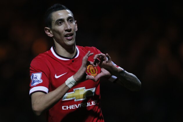 Manchester United’s Angel Di Maria celebrates after scoring his sides second goal of the game during their English FA Cup third round soccer match between Yeovil Town and Manchester United at Huish Park stadium in Yeovil, England, Sunday, Jan.  4, 2015 . (AP Photo/Alastair Grant)
