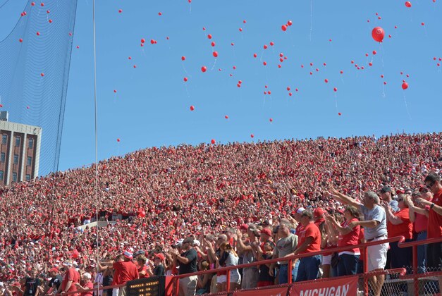 Aug 30, 2014; Lincoln, NE, USA; Nebraska Cornhuskers fans release red balloons after a score during the second half against the Florida Atlantic Owls at Memorial Stadium. Nebraska won 55-7. Mandatory Credit: Denny Medley-USA TODAY Sports