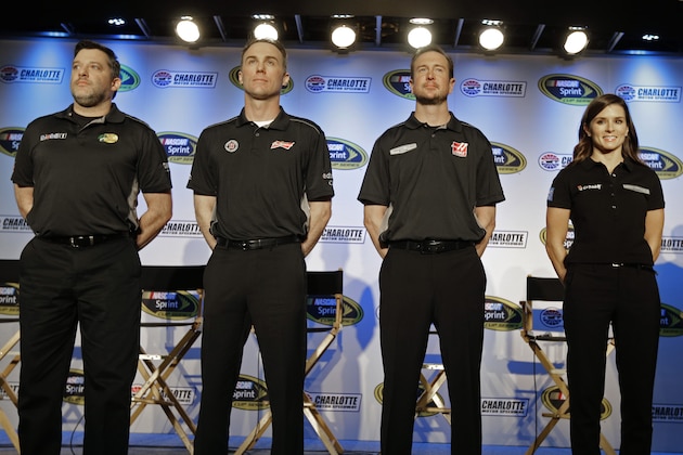 Stewart-Haas Racing drivers, from left, Tony Stewart, Kevin Harvick, Kurt Busch, and Danica Patrick pose for a photo during the NASCAR Charlotte Motor Speedway media tour in Charlotte, N.C., Tuesday, Jan. 27, 2015. (AP Photo/Chuck Burton) Stewart-Haas Racing drivers, from left, Tony Stewart, Kevin Harvick, Kurt Busch, and Danica Patrick pose for a photo during the NASCAR Charlotte Motor Speedway media tour in Charlotte, N.C., Tuesday, Jan. 27, 2015. (AP Photo/Chuck Burton)