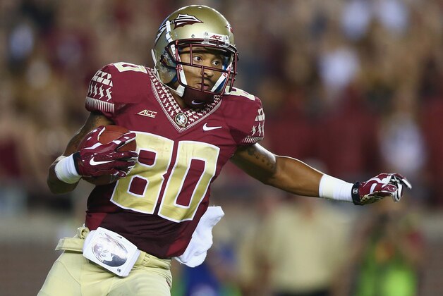 TALLAHASSEE, FL - SEPTEMBER 20:  Rashad Greene #80 of the Florida State Seminoles runs the ball against the Clemson Tigers at Doak Campbell Stadium on September 20, 2014 in Tallahassee, Florida.  (Photo by Ronald Martinez/Getty Images)