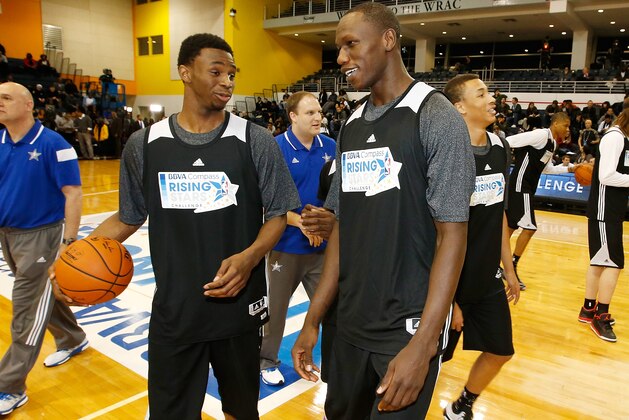 NEW YORK, NY - FEBRUARY 12: Andrew Wiggins of the Minnesota Timberwolves talks with teammate Gorgui Dieng during the BBVA Compass Rising Stars Practice at NBA House presented by BBVA Compass in the LIU Paramount Theatre during the 2015 NBA All-Star on February 12, 2015 in Brooklyn, New York.  NOTE TO USER: User expressly acknowledges and agrees that, by downloading and/or using this photograph, user is consenting to the terms and conditions of the Getty Images License Agreement.  Mandatory Copyright Notice: Copyright 2015 NBAE (Photo by Gregory Shamus/NBAE via Getty Images)