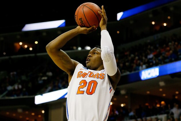 MEMPHIS, TN - MARCH 27:  Michael Frazier II #20 of the Florida Gators takes a shot against the UCLA Bruins during a regional semifinal of the 2014 NCAA Men's Basketball Tournament at the FedExForum on March 27, 2014 in Memphis, Tennessee.  (Photo by Kevin C. Cox/Getty Images)