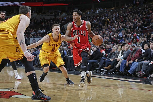 CHICAGO, IL - FEBRUARY 12:  Derrick Rose #1 of the Chicago Bulls handles the ball against the Cleveland Cavaliers during the game on February 12, 2015 at the United Center in Chicago, Illinois. NOTE TO USER: User expressly acknowledges and agrees that, by downloading and or using this Photograph, user is consenting to the terms and conditions of the Getty Images License Agreement. Mandatory Copyright Notice: Copyright 2015 NBAE (Photo by Jeff Haynes/NBAE via Getty Images)