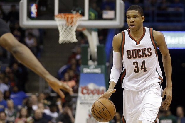 Milwaukee Bucks' Giannis Antetokounmpo dribbles during an NBA basketball game against the Sacramento Kings Wednesday, Feb. 11, 2015, in Milwaukee. (AP Photo/Aaron Gash)
