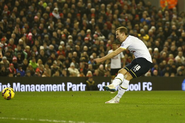 Tottenham's Harry Kane scores during the English Premier League soccer match between Liverpool and Tottenham Hotspur at Anfield Stadium, Liverpool, England, Tuesday Feb. 10, 2015. (AP Photo/Jon Super)