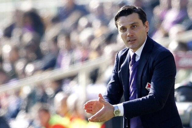 Fiorentina coach Vincenzo Montella follows a Serie A soccer match between Fiorentina and Atalanta at the Artemio Franchi stadium in Florence, Italy, Sunday, Feb. 8, 2015. (AP Photo/Fabrizio Giovannozzi)