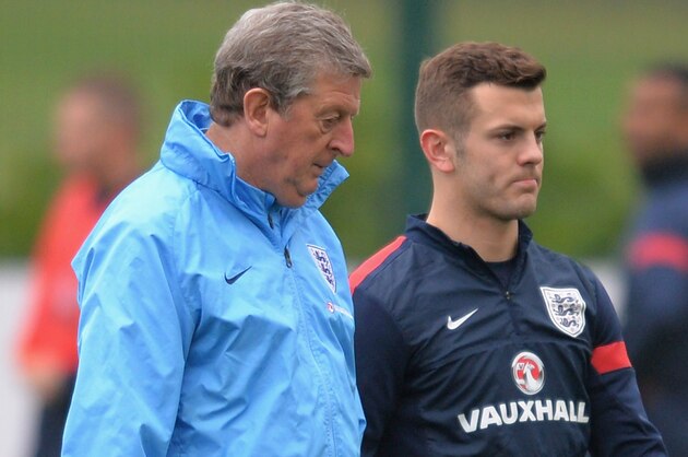 ST ALBANS, ENGLAND - NOVEMBER 18:  Coach Roy Hodgson talks to Jack Wilshere during a England Training session at London Colney on November 18, 2013 in St Albans, England.  (Photo by Christopher Lee/Getty Images)