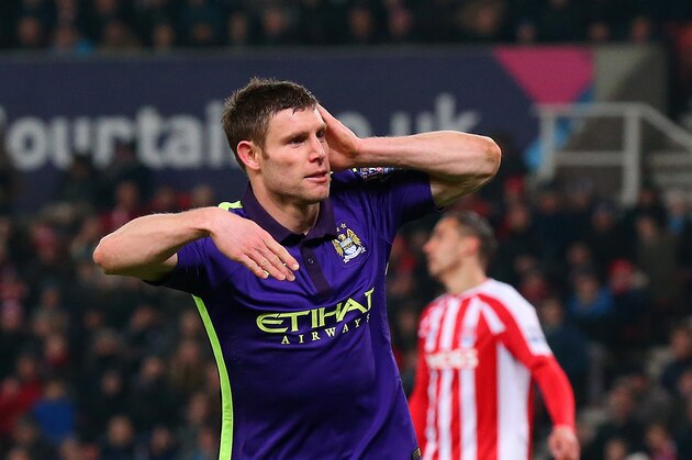 STOKE ON TRENT, ENGLAND - FEBRUARY 11:  James Milner of Manchester City celebrates after scoring his team's second goal during the Barclays Premier League match between Stoke City and Manchester City at Britannia Stadium on February 11, 2015 in Stoke on Trent, England.  (Photo by Alex Livesey/Getty Images)