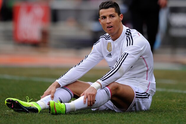 MADRID, SPAIN - FEBRUARY 07:  Cristiano Ronaldo of Real Madrid looks on after taking a fall during the La Liga match between Club Atletico de Madrid and Real Madrid at Vicente Calderon Stadium on February 7, 2015 in Madrid, Spain.  (Photo by Denis Doyle/Getty Images)