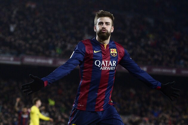 FC Barcelona's Gerard Pique, reacts after scoring against Villarreal during a semifinal, first leg, Copa del Rey soccer match at the Camp Nou stadium in Barcelona, Spain, Wednesday, Feb. 11, 2015. (AP Photo/Manu Fernandez)