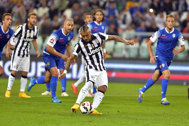 Juventus Arturo Vidal scores during a Serie A soccer match between Juventus and Cesena at the Juventus stadium, in Turin, Italy, Wednesday, Sept. 24, 2014. (AP Photo/Massimo Pinca)