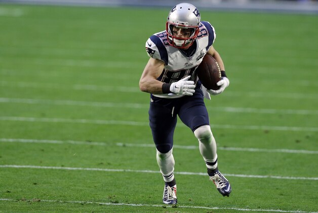 New England Patriots wide receiver Danny Amendola (80) carries the ball during the first half of NFL Super Bowl XLIX football game against the Seattle Seahawks on Sunday, Feb. 1, 2015, in Glendale, Ariz. (AP Photo/Brynn Anderson)