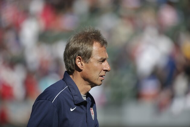 United States men's national soccer team coach Jurgen Klinsmann walks off the field after the first half of a friendly soccer match against Panama, Sunday, Feb. 8, 2015, in Carson, Calif. (AP Photo/Jae C. Hong)