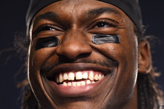 LANDOVER, MD - DECEMBER 20: Quarterback Robert Griffin III #10 of the Washington Redskins celebrates after defeating the Philadelphia Eagles at FedExField on December 20, 2014 in Landover, Maryland. The Washington Redskins won, 27-24. (Photo by Patrick Smith/Getty Images)