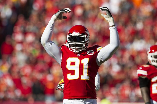 KANSAS CITY, MO - OCTOBER 27: Outside linebacker Tamba Hali #91 of the Kansas City Chiefs attempts to pumps up the crowd on fourth down during the game against the Cleveland Browns at Arrowhead Stadium on October 27, 2013 in Kansas City, Missouri. (Photo by David Welker/Getty Images) KANSAS CITY, MO - OCTOBER 27: Outside linebacker Tamba Hali #91 of the Kansas City Chiefs attempts to pumps up the crowd on fourth down during the game against the Cleveland Browns at Arrowhead Stadium on October 27, 2013 in Kansas City, Missouri. (Photo by David Welker/Getty Images)