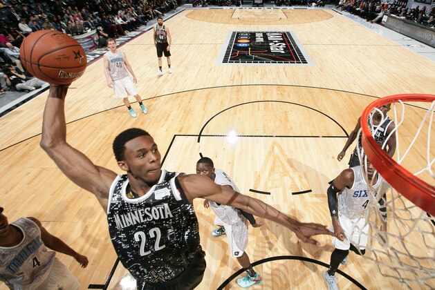 BROOKLYN, NY - FEBRUARY 13: Andrew Wiggins #22 of the World Team goes up to dunk during a game against the U.S. Team during the BBVA Compass Rising Stars Challenge as part of 2015 All-Star Weekend on February 13, 2015 at Barclays Center in Brooklyn, New York. NOTE TO USER: User expressly acknowledges and agrees that, by downloading and/or using this photograph, user is consenting to the terms and conditions of the Getty Images License Agreement.  Mandatory Copyright Notice: Copyright 2015 NBAE (Photo by Nathaniel S. Butler/NBAE via Getty Images)