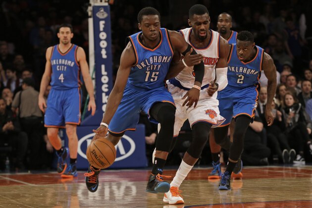 Oklahoma City Thunder guard Reggie Jackson (15) drives past New York Knicks guard Tim Hardaway Jr. during the first half of NBA basketball game, Wednesday, Jan. 28, 2015 at Madison Square Garden in New York. The Knicks won 100-92. (AP Photo/Mary Altaffer)