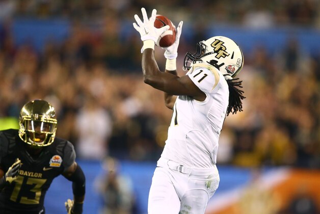 Jan 1, 2014; Glendale, AZ, USA; Central Florida Knights wide receiver Breshad Perriman (11) against the Baylor Bears during the Fiesta Bowl at University of Phoenix Stadium. Central Florida defeated Baylor 52-42. Mandatory Credit: Mark J. Rebilas-USA TODAY Sports