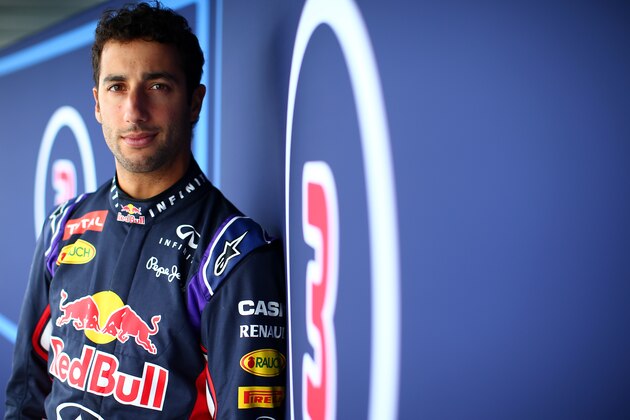 JEREZ DE LA FRONTERA, SPAIN - FEBRUARY 02:  Daniel Ricciardo of Australia and Infiniti Red Bull Racing poses outside the garage during day two of Formula One Winter Testing at Circuito de Jerez on February 2, 2015 in Jerez de la Frontera, Spain.  (Photo by Mark Thompson/Getty Images)
