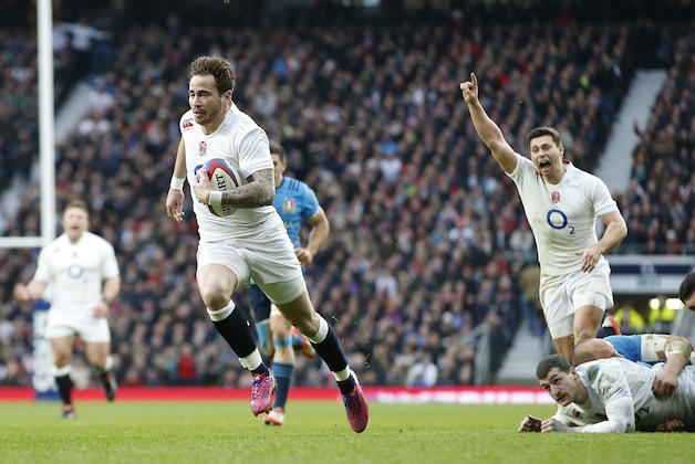England’s Danny Cipriani races clear to score a try during the Six Nations international rugby union match against Italy at Twickenham stadium in London, Saturday, Feb. 14, 2015. (AP Photo/Alastair Grant)