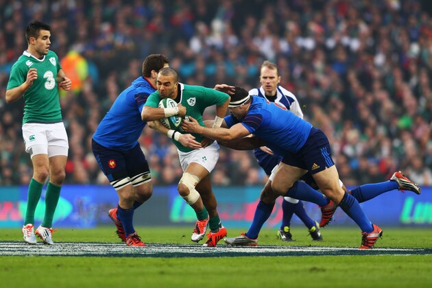 DUBLIN, IRELAND - FEBRUARY 14:  Simon Zebo of Ireland is tackled by Damien Chouly (2L) and Guilhem Guirado of France (R) during the RBS Six Nations match between Ireland and France at Aviva Stadium on February 14, 2015 in Dublin, Ireland.  (Photo by Michael Steele/Getty Images)