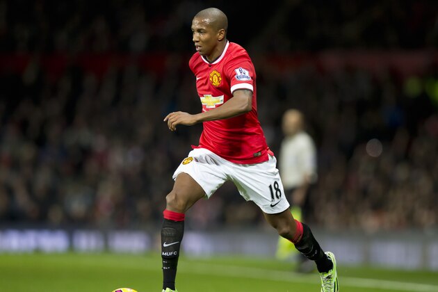 Manchester United's Ashley Young during the English Premier League soccer match between Manchester United and Stoke City at Old Trafford Stadium, Manchester, England, Tuesday Dec. 2, 2014. (AP Photo/Jon Super)