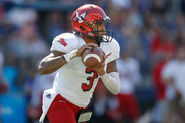 SEATTLE, WA - SEPTEMBER 06:  Quarterback Vernon Adams Jr. #3 of the Eastern Washington Eagles looks downfield to pass against the Washington Huskies on September 6, 2014 at Husky Stadium in Seattle, Washington.  (Photo by Otto Greule Jr/Getty Images)