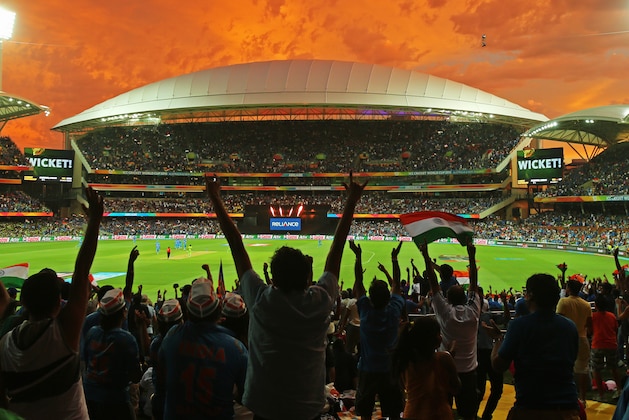 ADELAIDE, AUSTRALIA - FEBRUARY 15:  A general view as Indian fans in the crowd celebrate as a Pakistan wicket falls during the 2015 ICC Cricket World Cup match between India and Pakistan at Adelaide Oval on February 15, 2015 in Adelaide, Australia.  (Photo by Scott Barbour/Getty Images)