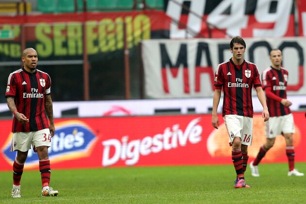 MILAN, ITALY - FEBRUARY 15:  Players of Milan show their dejection during the Serie A match between AC Milan and Empoli FC at Stadio Giuseppe Meazza on February 15, 2015 in Milan, Italy.  (Photo by Maurizio Lagana/Getty Images)