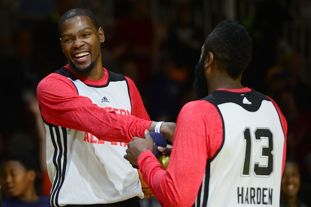 Feb 15, 2014; New Orleans, LA, USA; 2014 Western Conference All-Stars forward Kevin Durant (Thunder) (35) and guard James Harden (Rockets) (13) react during the practice session at Ernest N. Morial Convention Center. Mandatory Credit: Bob Donnan-USA TODAY Sports